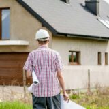 an reo contractor looking at a house